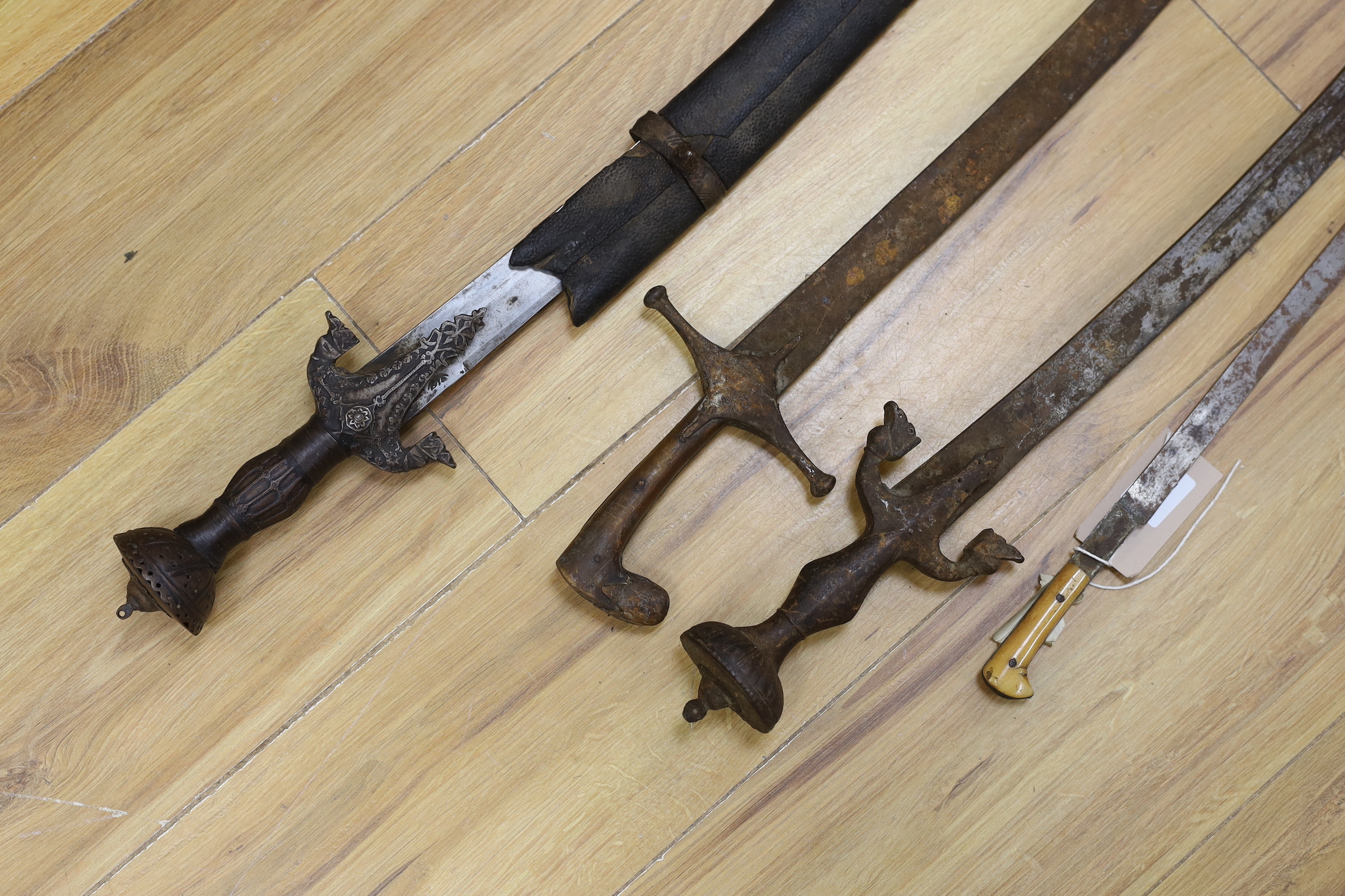 Two Indian Tulwars and two Yatagans